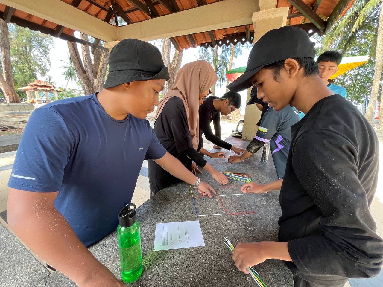 2 - Leadership program participants demonstrating the power of teamwork in action