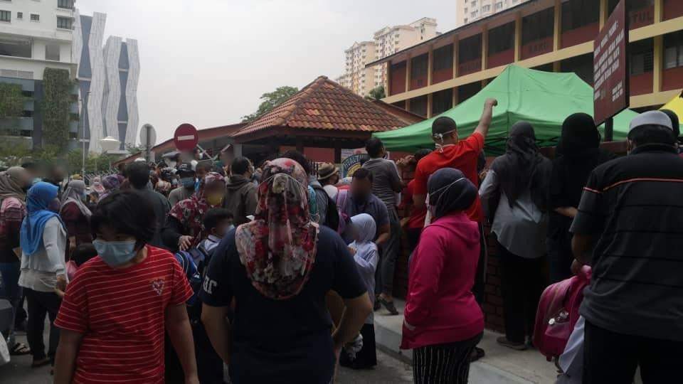 Netizens raise concern over parents crowding outside schools | weirdkaya