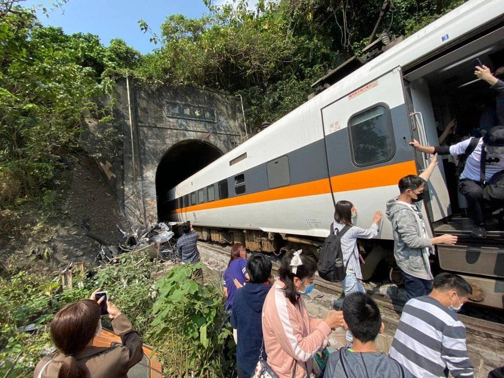 Taiwan train crashes into truck and derails, kills 36 and injures many
