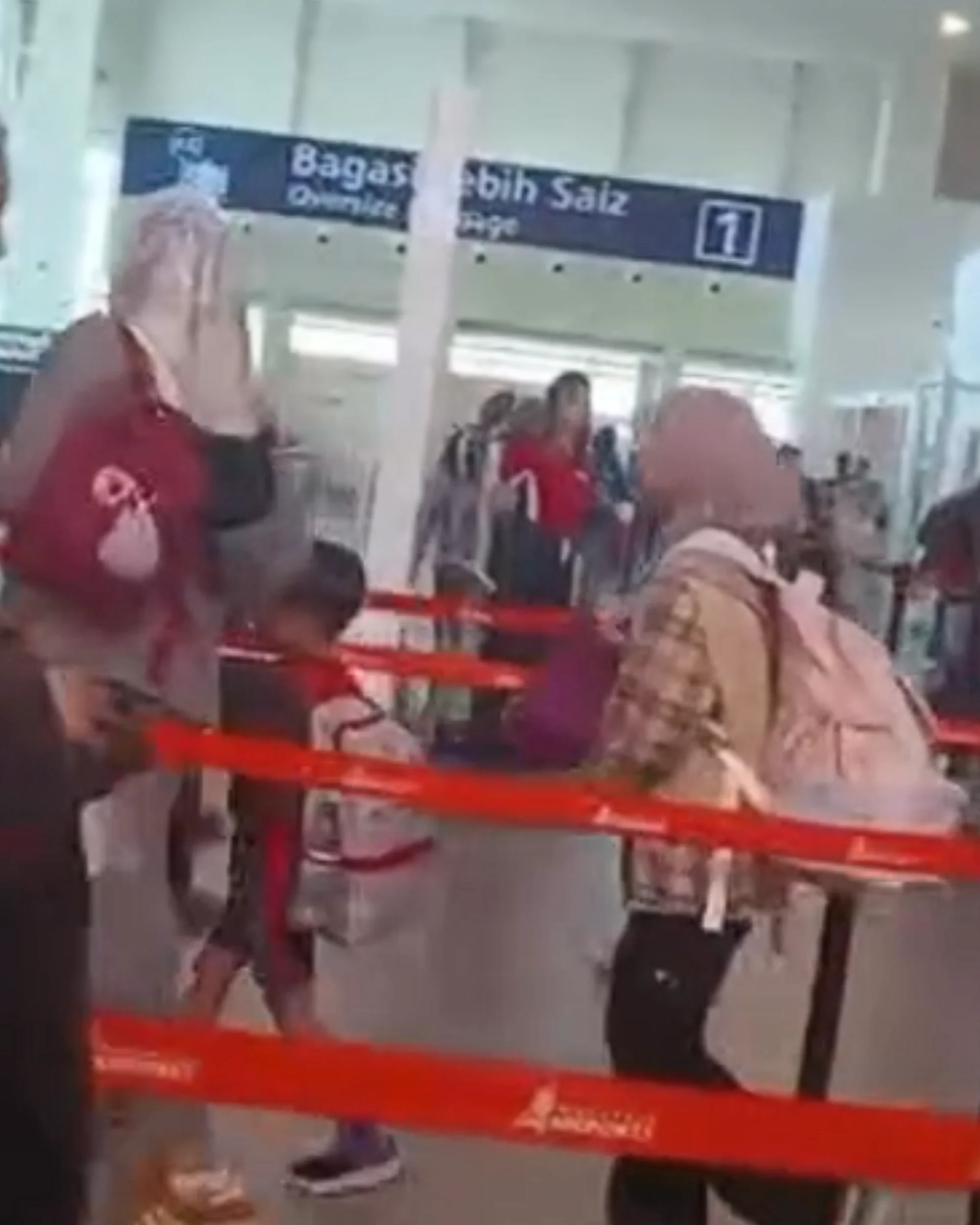 Ask to get bag through security ( )