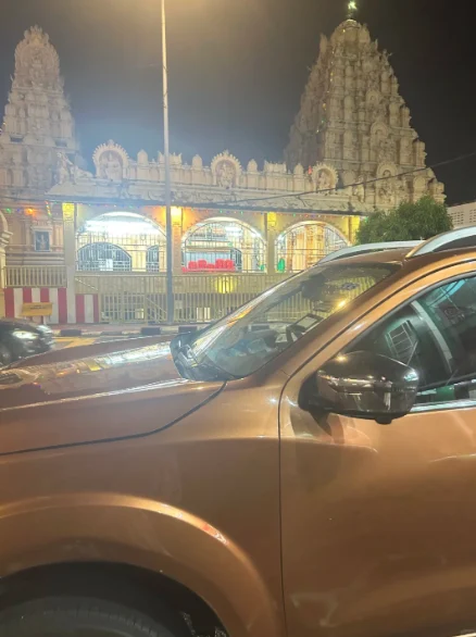 Car stopped at roadside ( )