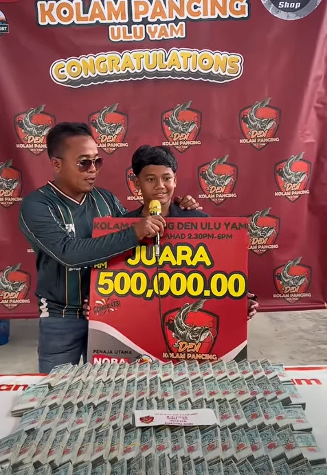 Win rm k in fishing competition ( )