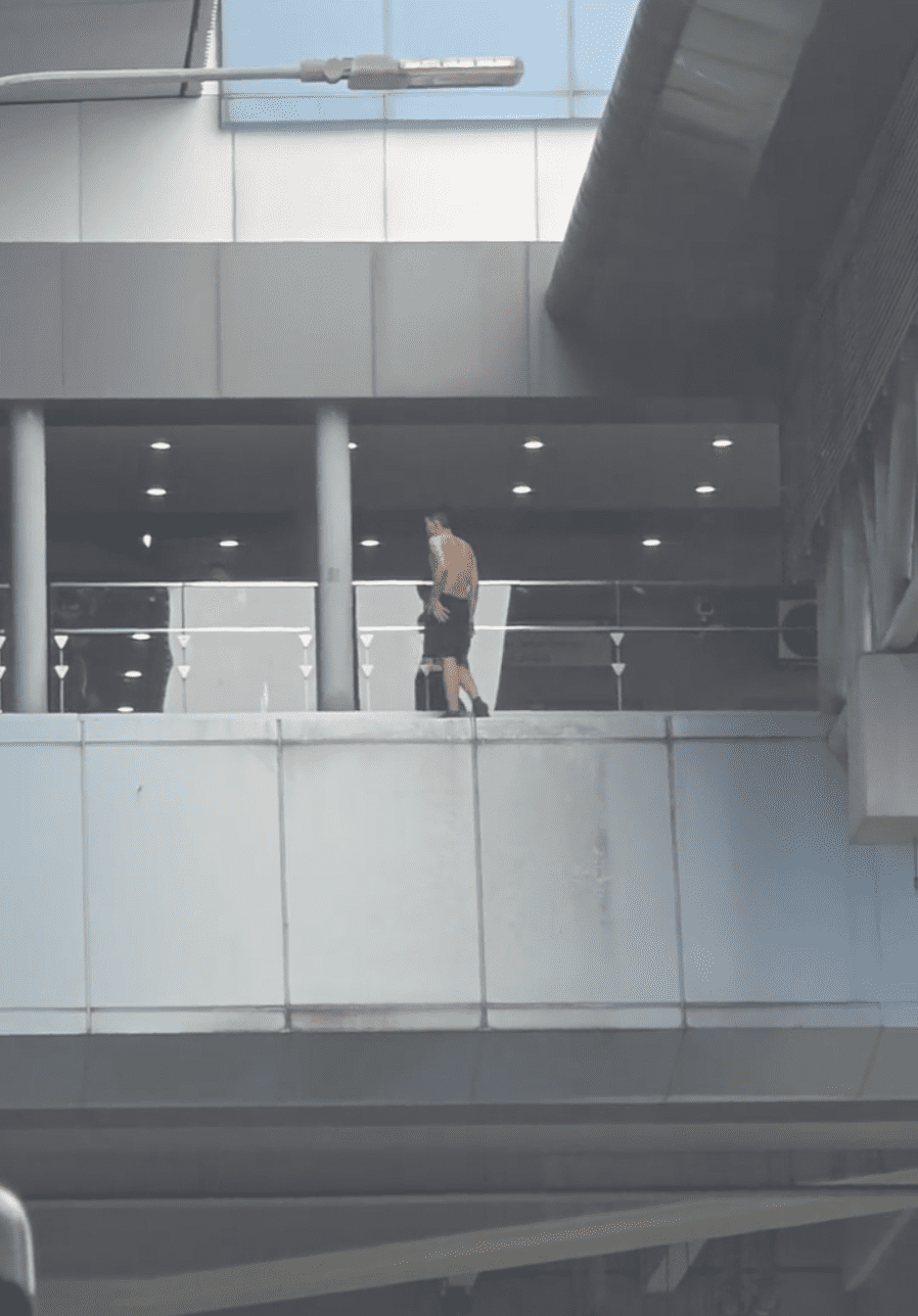Taiwanese man seen walking on the ledge at midah mrt station