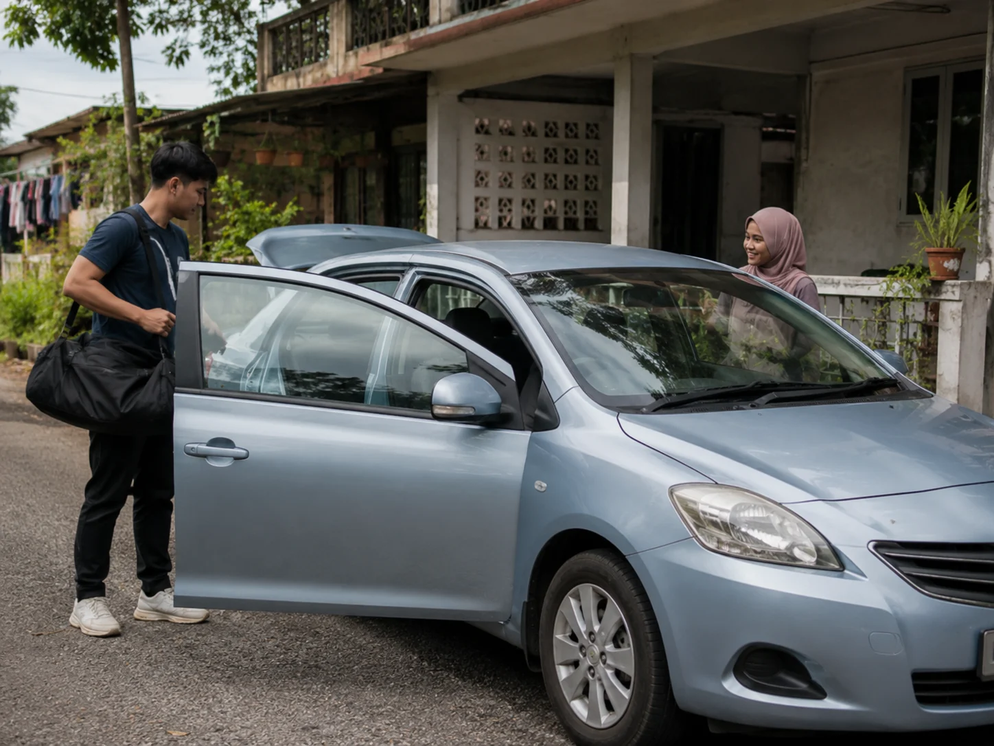  wk loading the blue silver sedan 