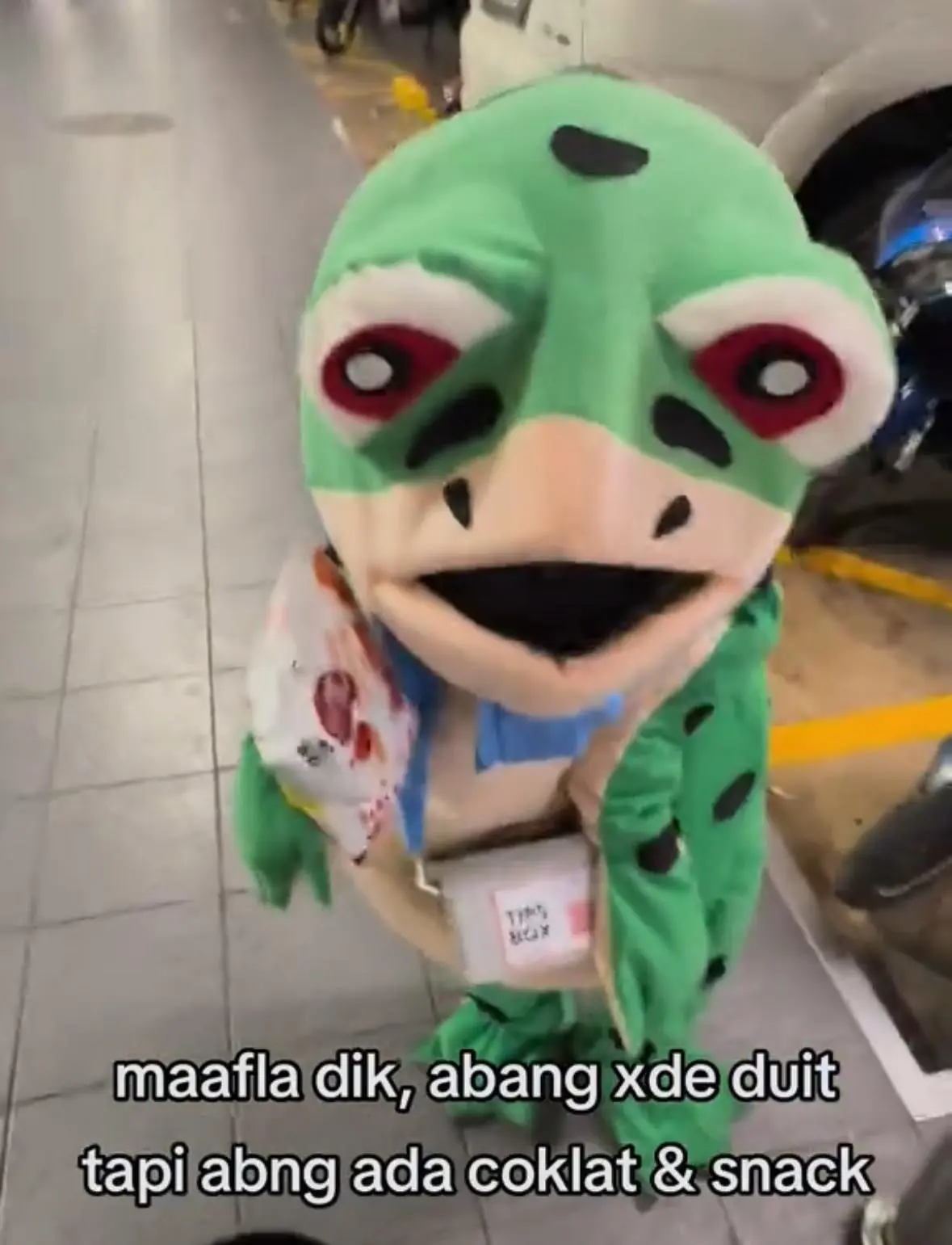 "Too Young for This" - Boy In Frog Costume Seen Collecting Donations Alone Under The Hot Sun In Parking Lot
