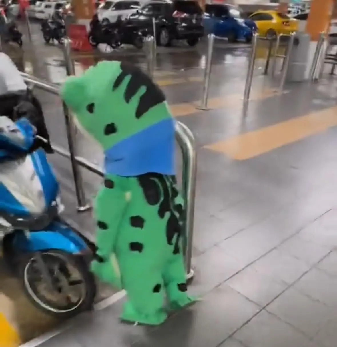 "Too Young for This" - Boy In Frog Costume Seen Collecting Donations Alone Under The Hot Sun In Parking Lot