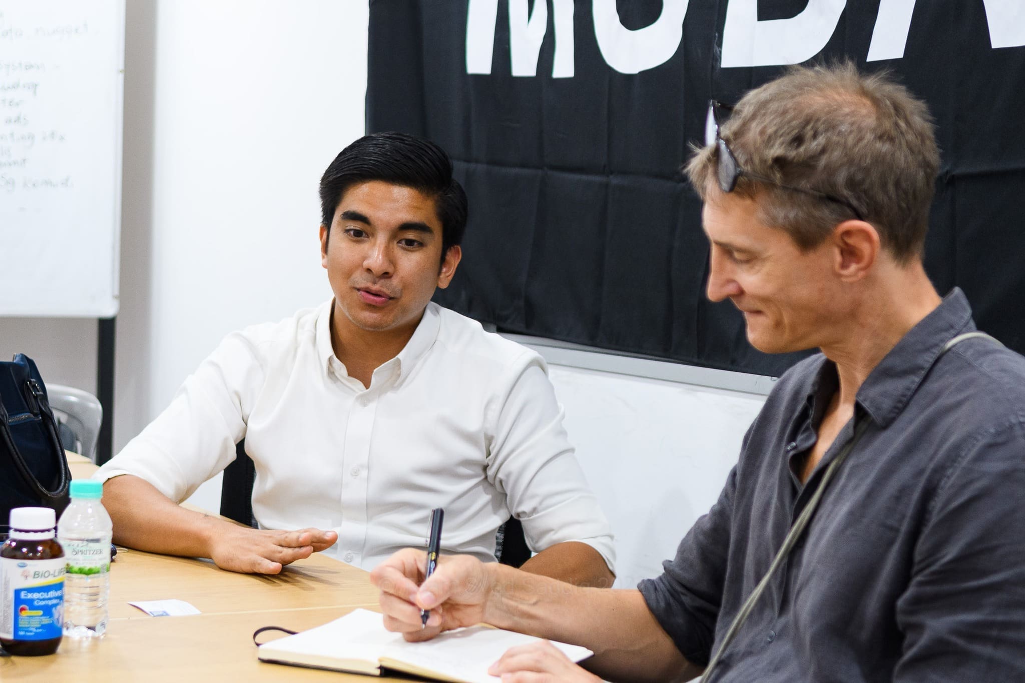 Syed Saddiq in a meeting