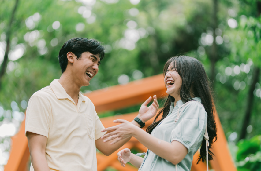 Asian couple laughing