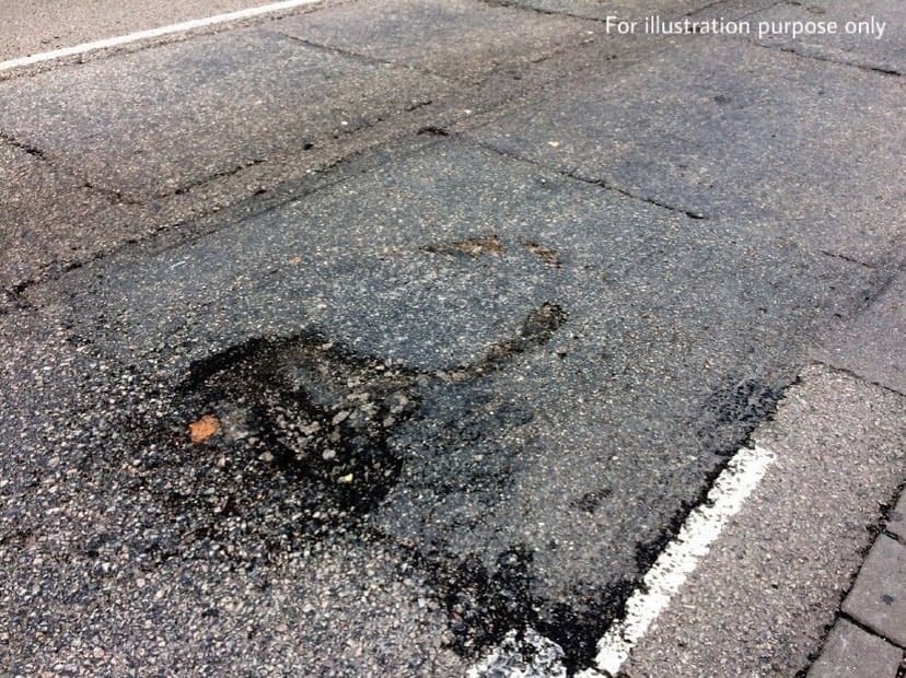 M'sian Club Members Fix Potholes Themselves To Prevent More Accidents From Happening