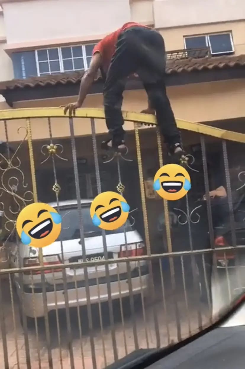 J&T delivery man going about his business sending a parcel to its destination.
