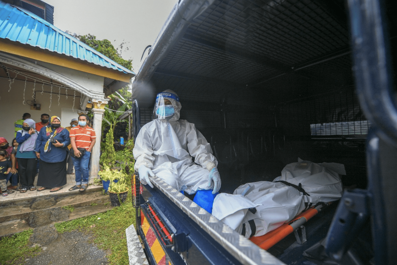 Victim's body after being slashed by her son
