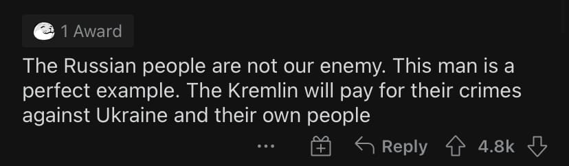 Russian soldier sipping tea and eating treated by Ukrainian comment 1