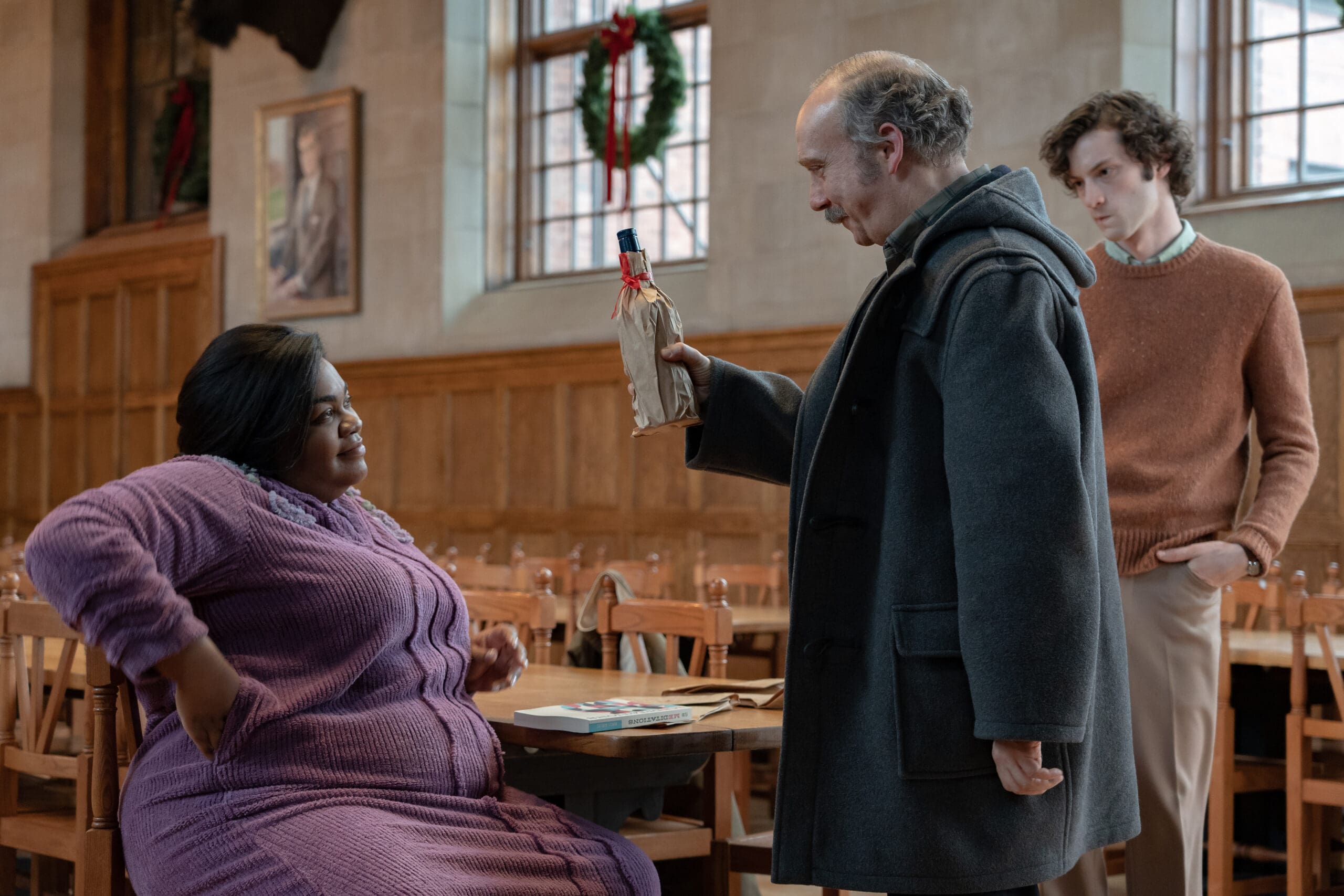 a man giving beer to a woman