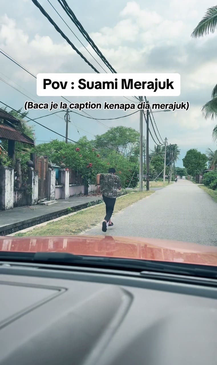 a man running along the roadside