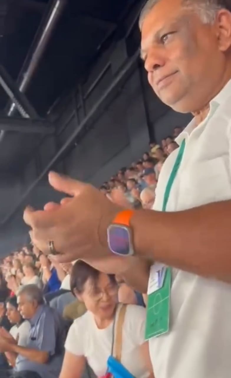 AirAsia CEO clapping hand at the Olympic games at Paris