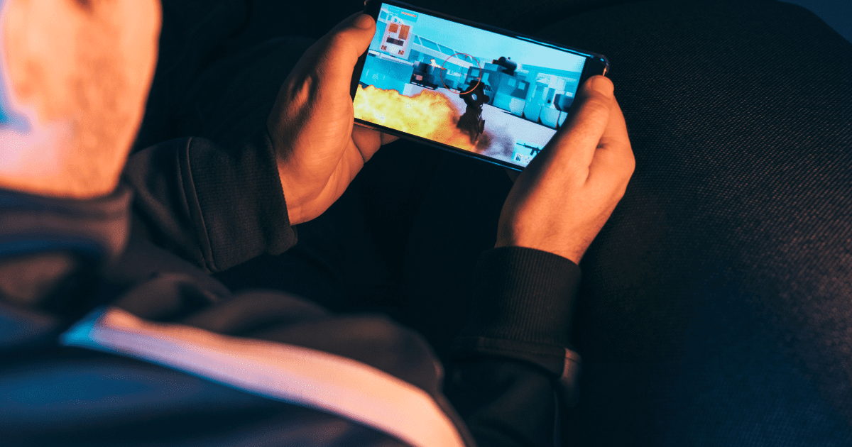 an playing game in phone