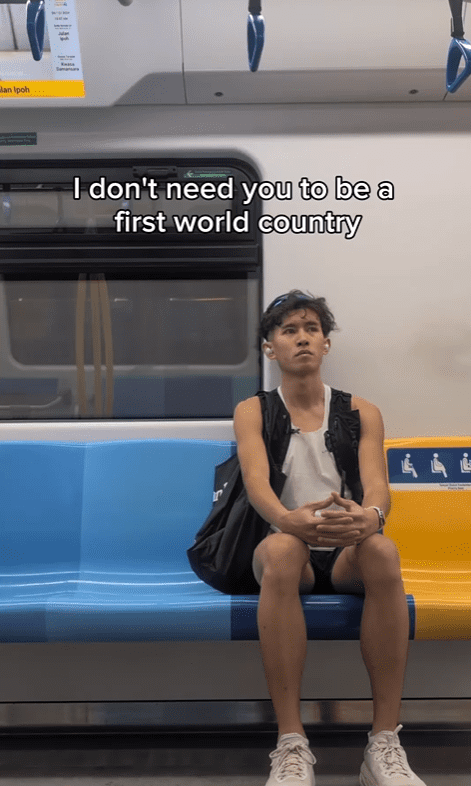 Andrew Kuan on the MRT