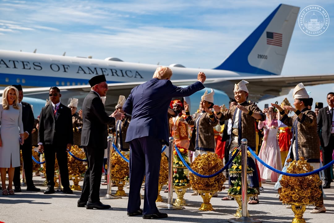 Anwar and Donald Trump dancing at airport