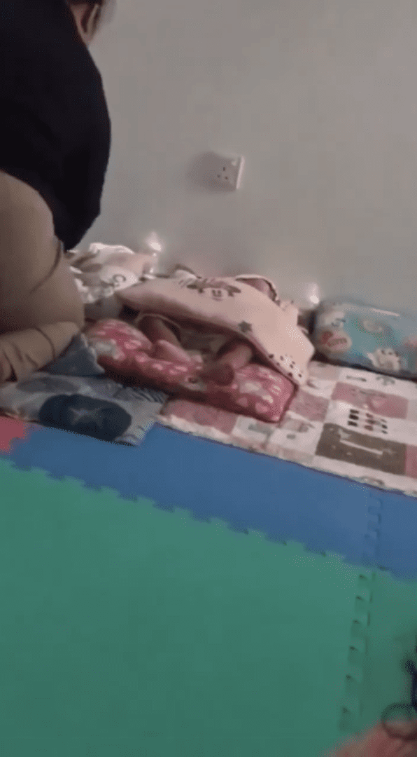 21yo M'sian babysitter handling crying babies in  a rough manner