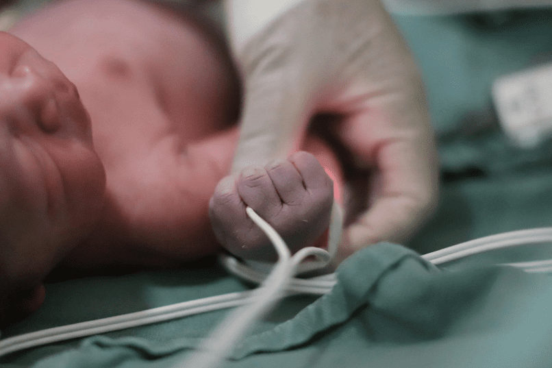 Baby being born