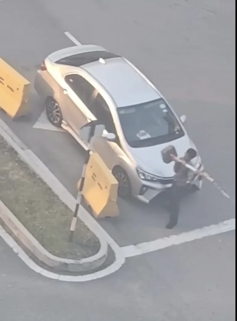 Bezza Parked At Road Corner Ends Up Having Metal Barrier Pole Placed On Its Bonnet 1