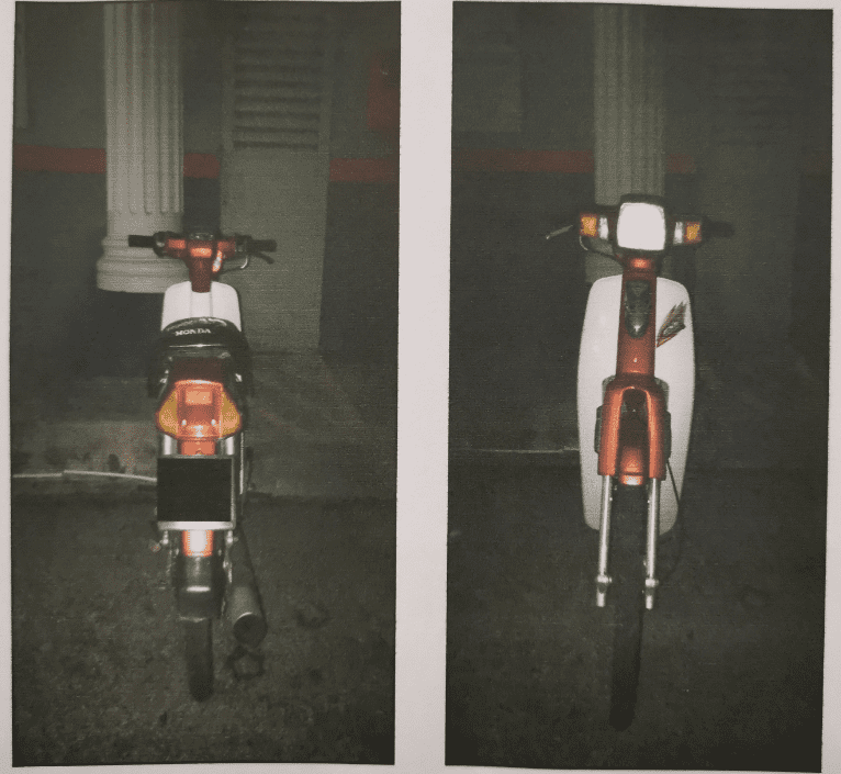 red Honda Ex-5 motorcycle