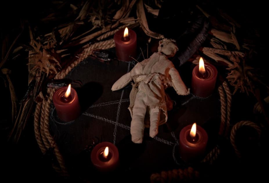 black magic with voodoo doll