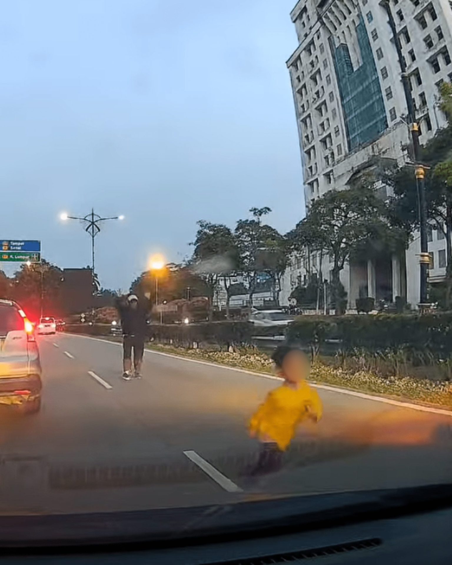 boy dashing on road