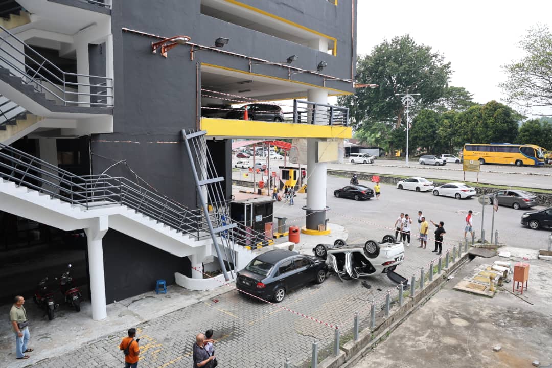 Car falls from parking lot in Seremban