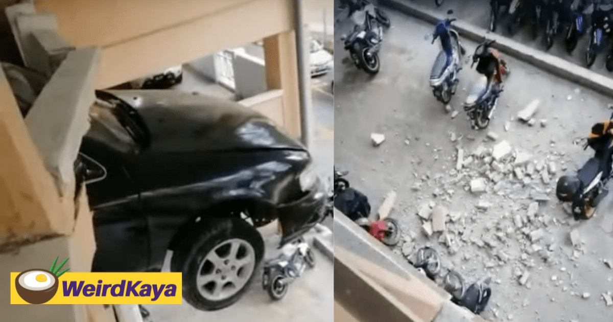 Car Left Half Hanging In A KL Car Park As Driver Step On Accelerator By Mistake
