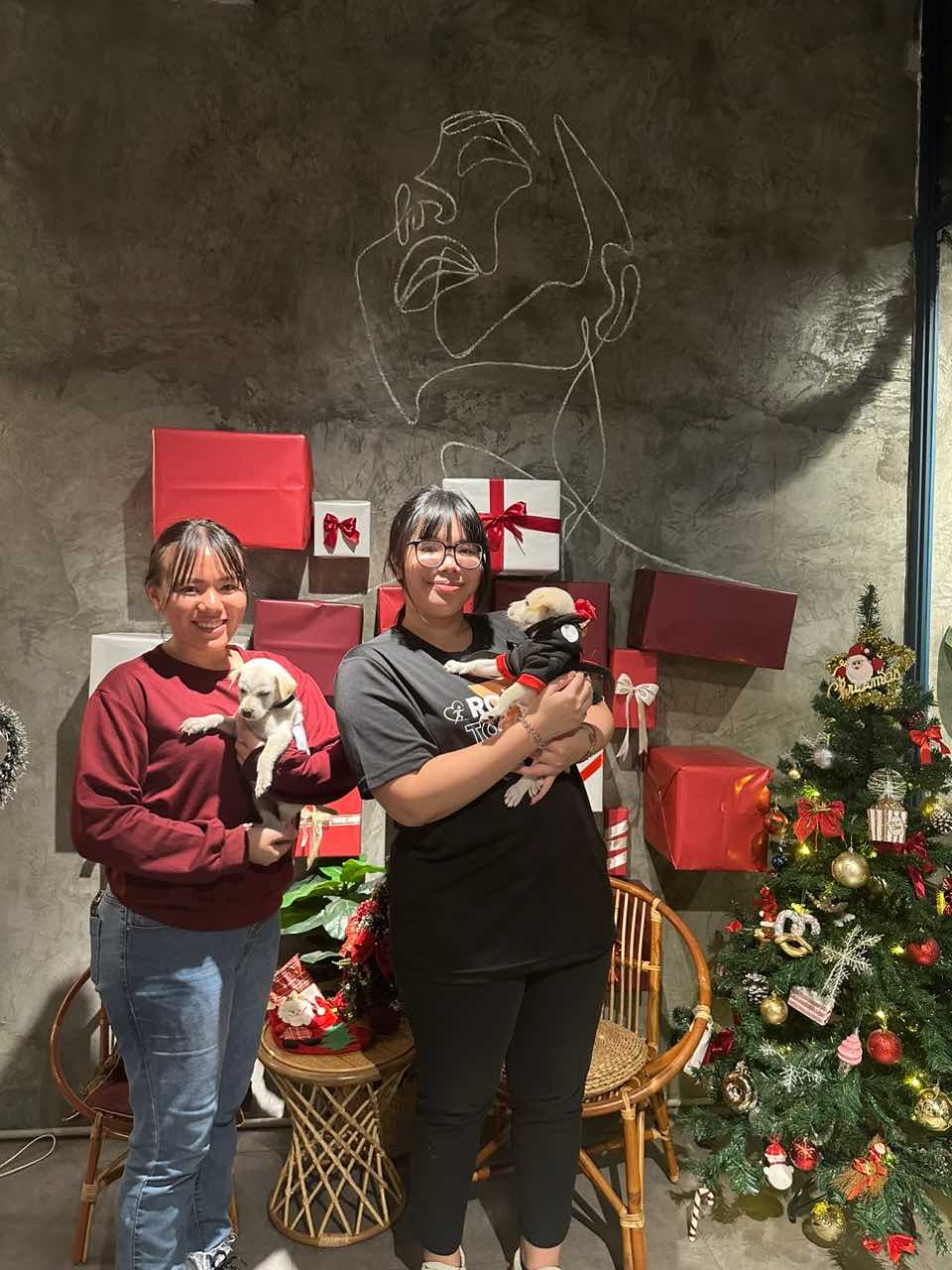 C'est la vie cafe cafe owner with puppies