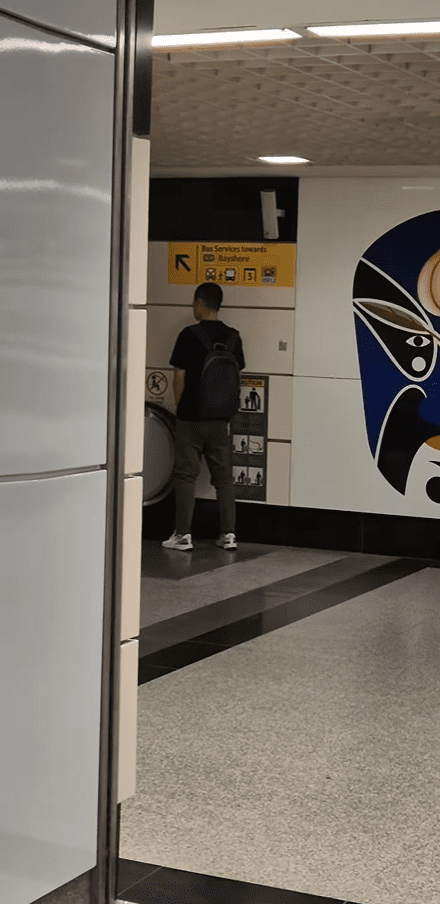 Close up of man urinating on escalator