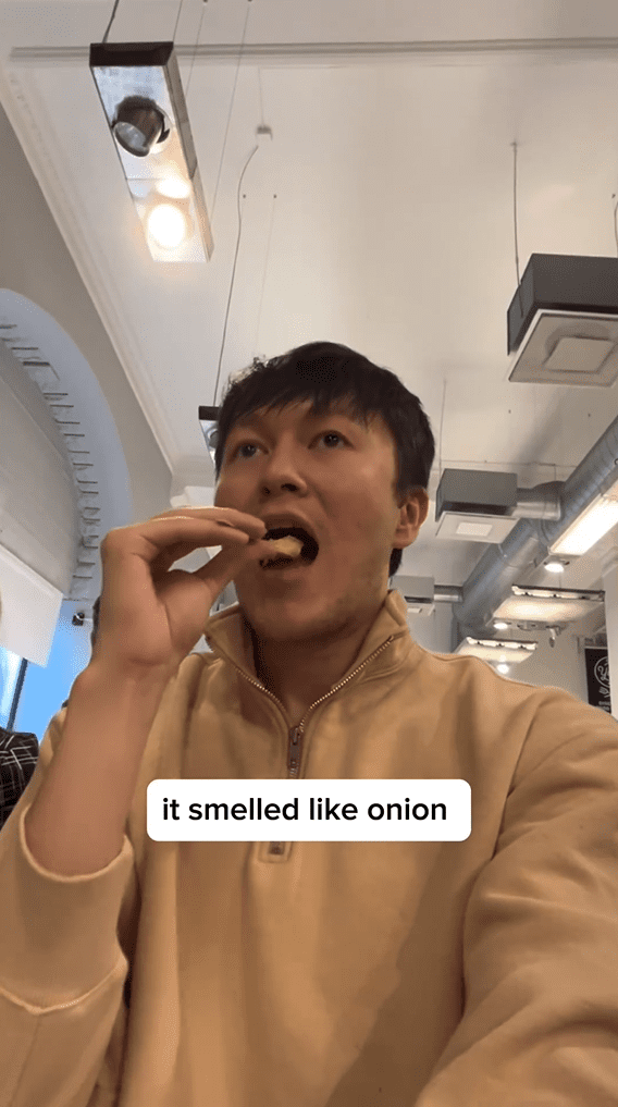 Content creator Karim Bukhadurov trying out durian