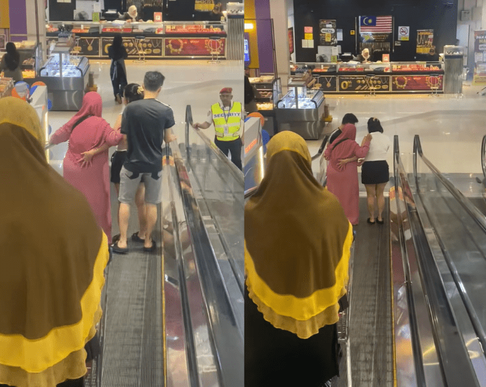 Couple helps makcik on escalator (1)