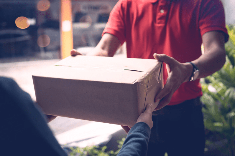 Delivery person sending parcel