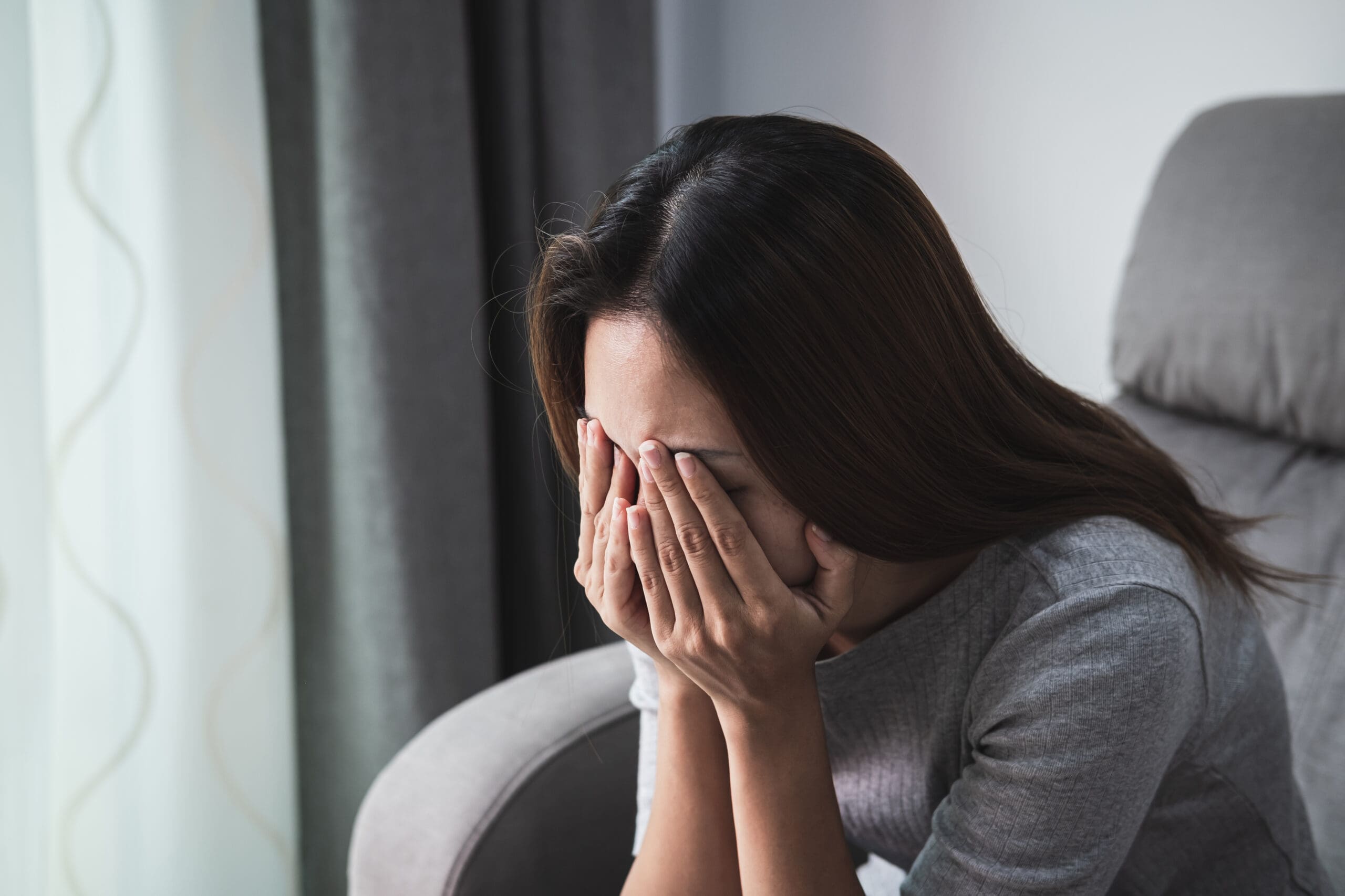 Depressed and sadness woman crying alone