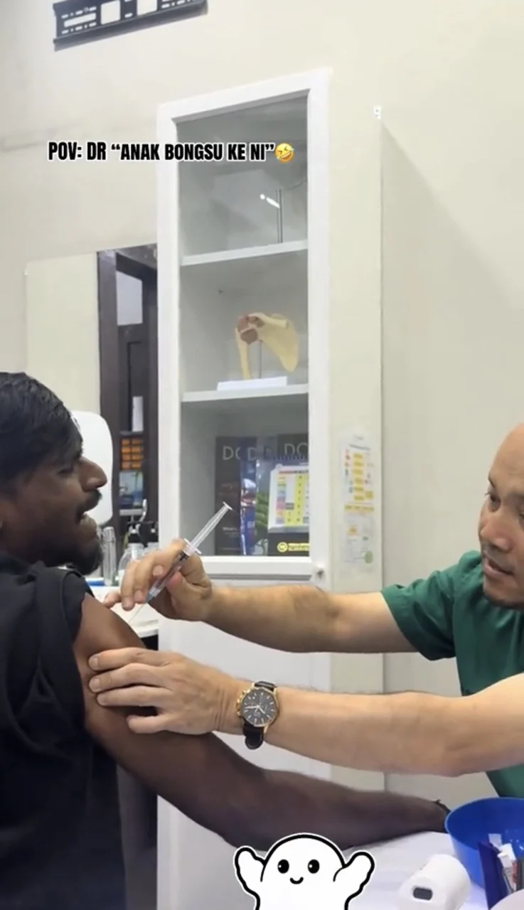 doctor injecting 21yo patient