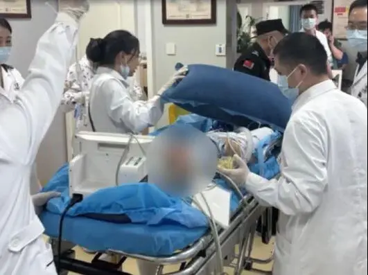 Doctors working to treat China boy who fell from 20th floor