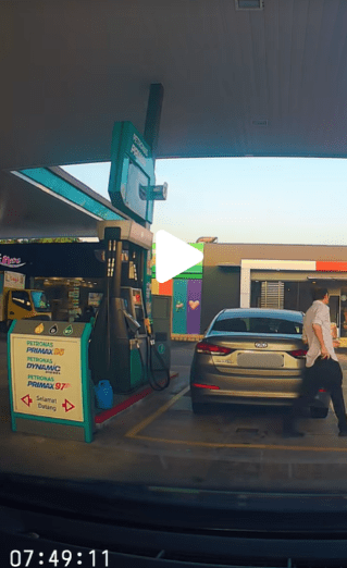 Driver walking away in shame