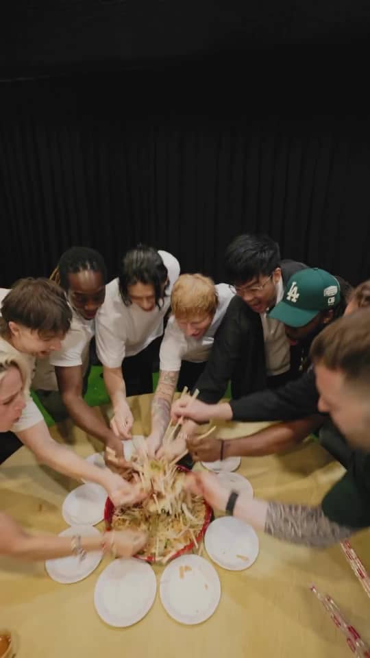 ed sheeran and his team tossing yee sang