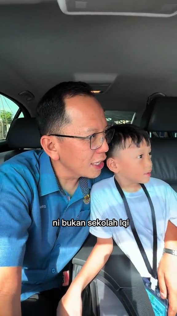 father and son sitting in the car