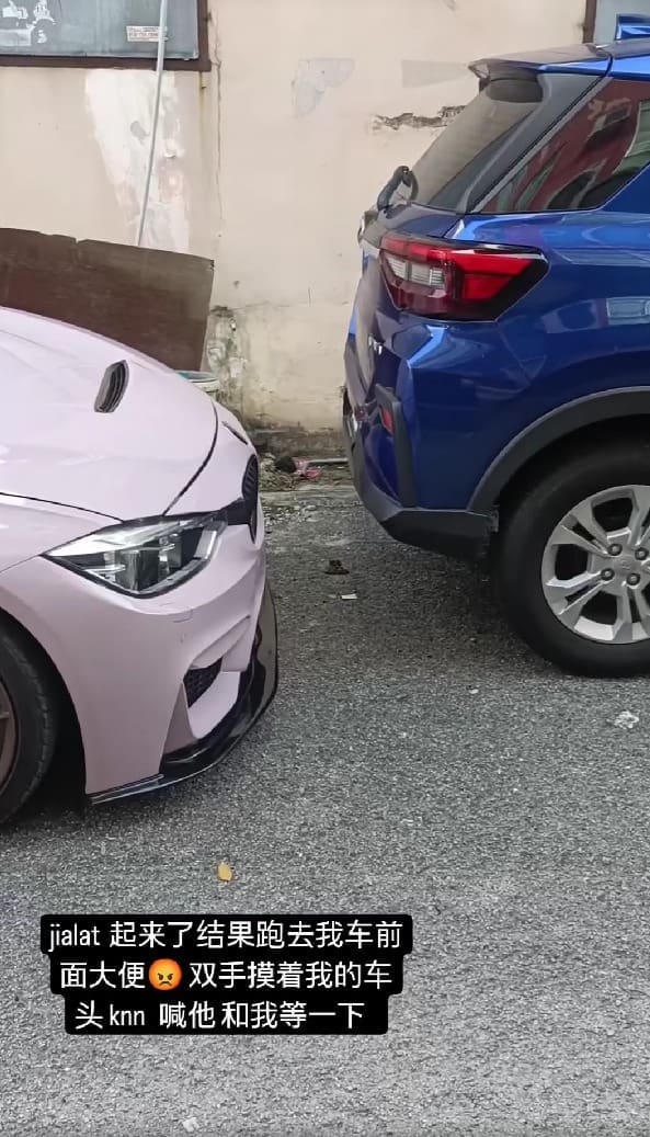 foreign man poop infront of a car