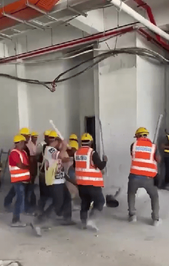 foreigner hitting a guy with iron rods