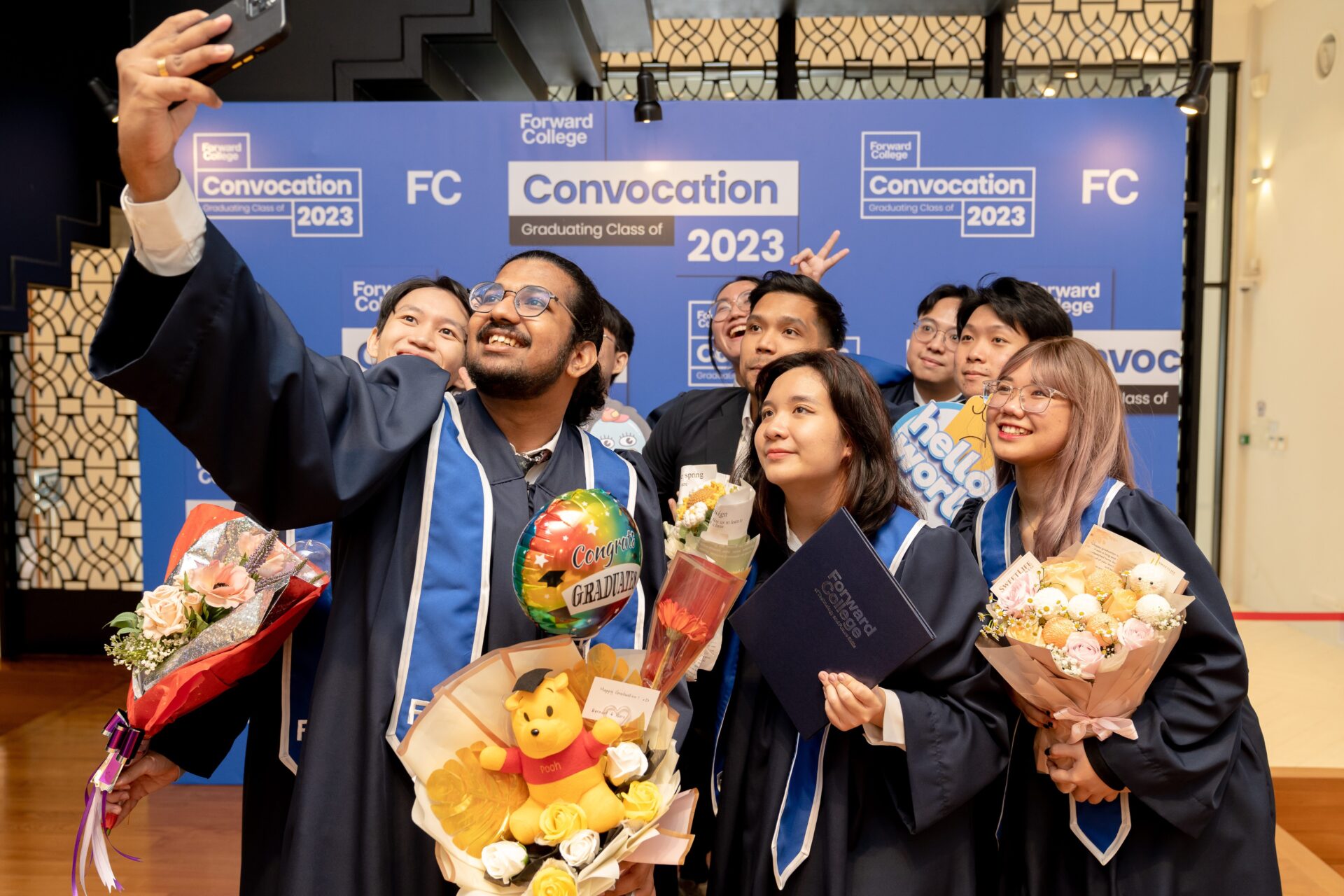 Forward College graduates celebrating their convocation as jobs await them