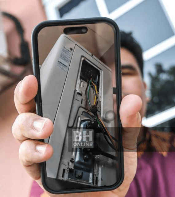 Friend shows wasp nest inside AC unit