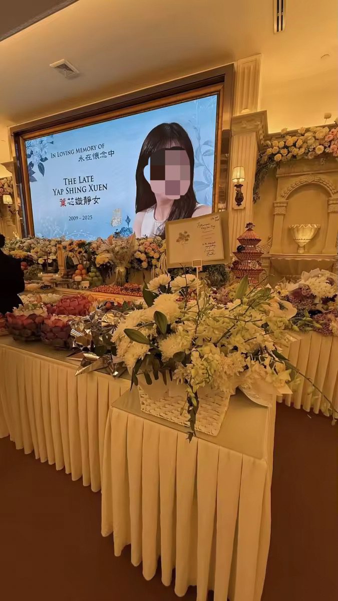 Funeral wreaths for Yap Shing Xuen