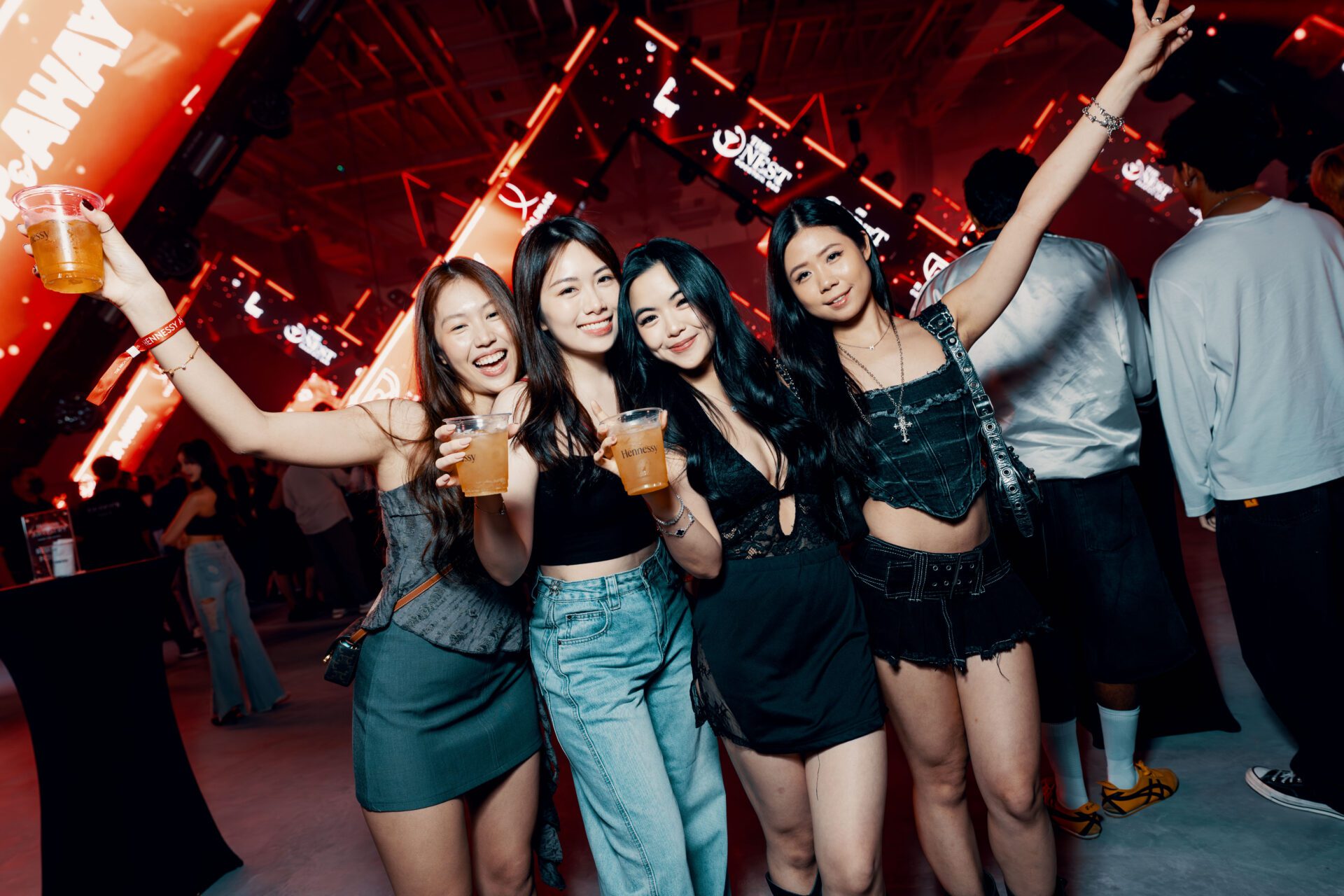 Guests Holding Hennessy