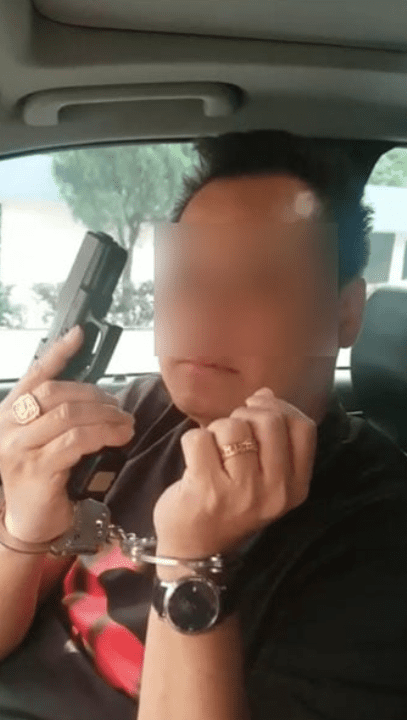M'sian Man Poses With A Gun While Handcuffed, Now Remanded For 4 Days By Police