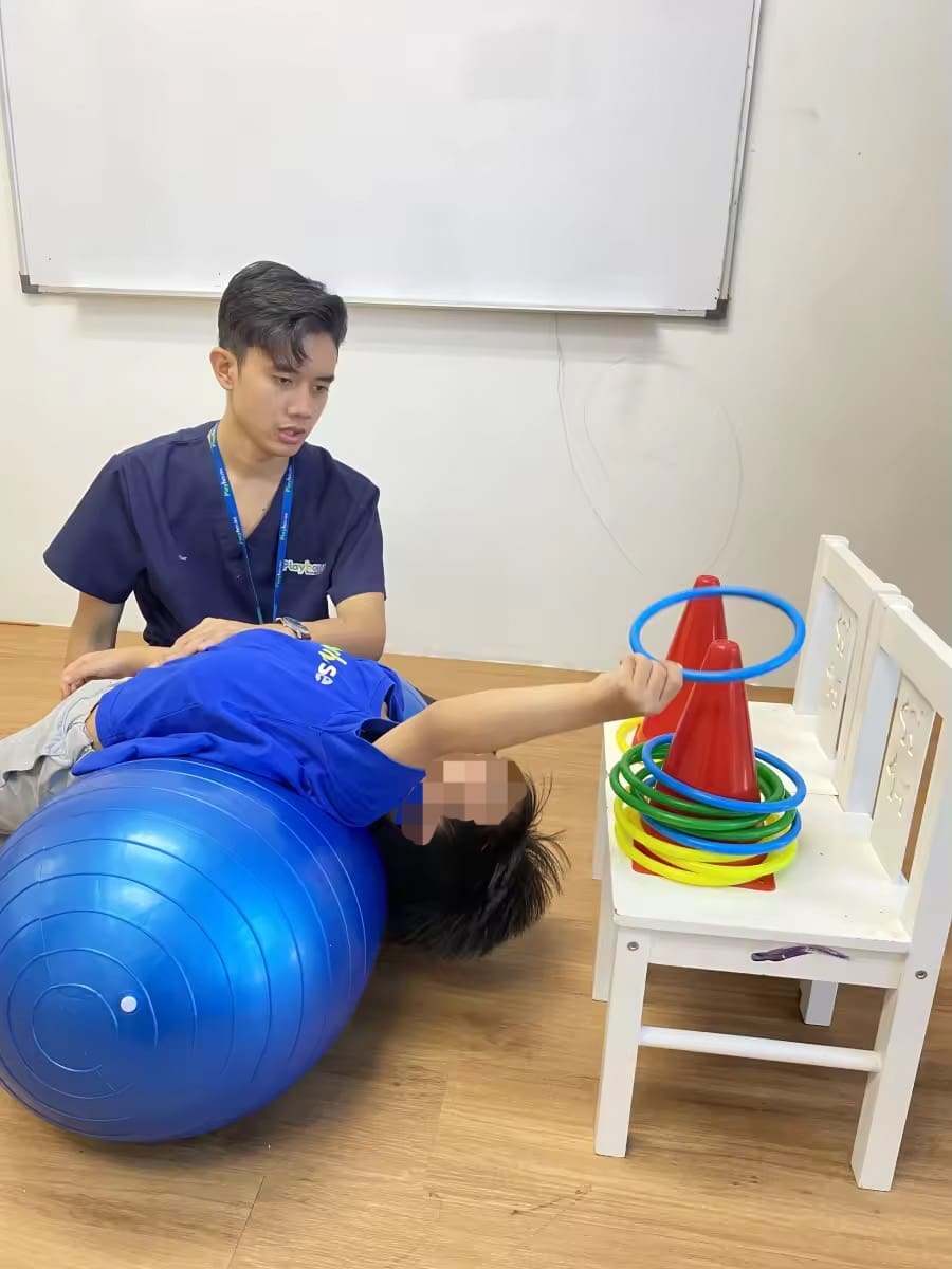 Haqim playing with kid