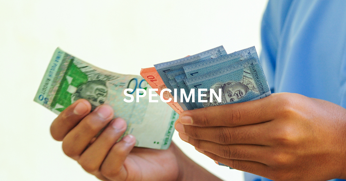 Holding ringgit notes